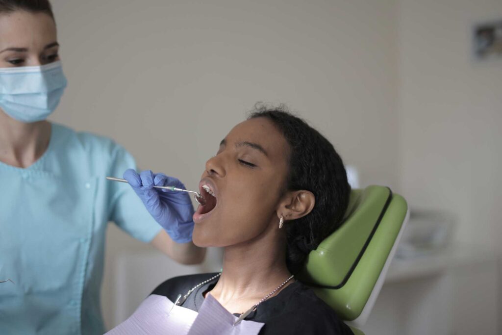 womn having her teeth checked