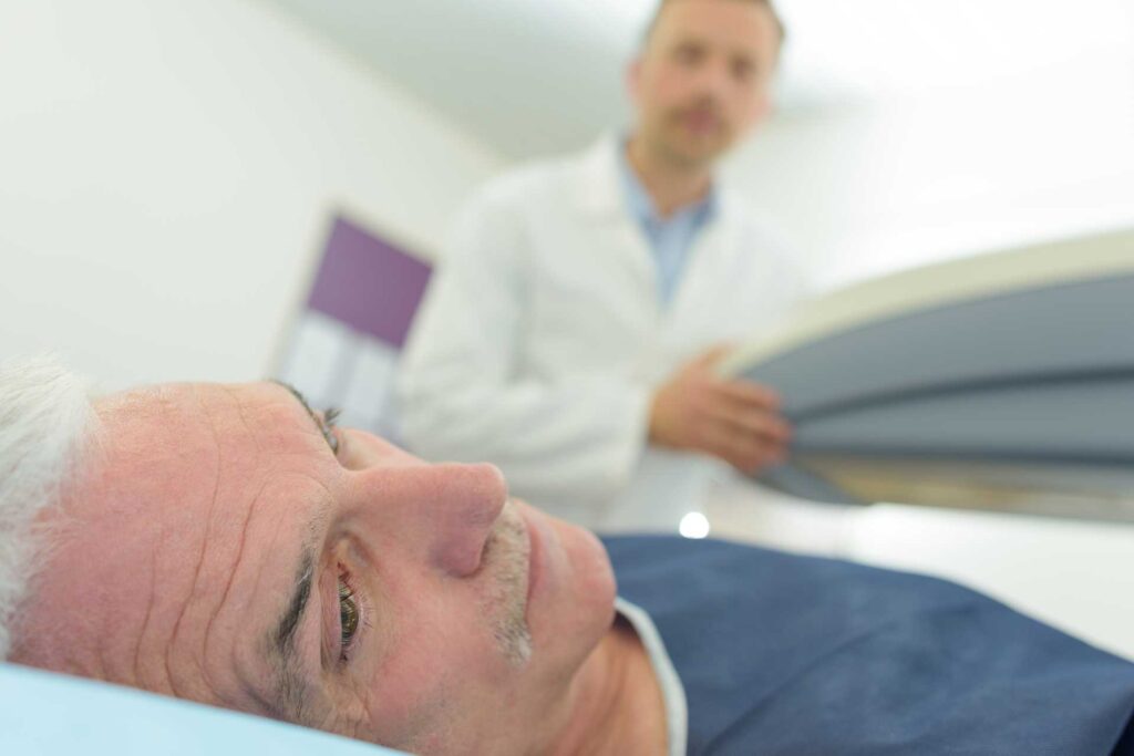 Primary Care doctor and patient on screening table