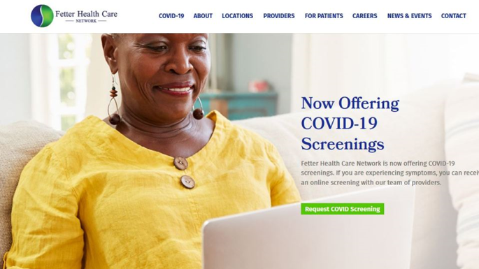 black woman working on a computer