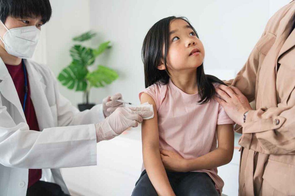 young girl at doctors office